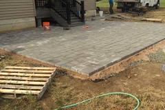 Paver patio with fire pit (during)