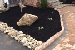 Foundation Bed with dark mulch